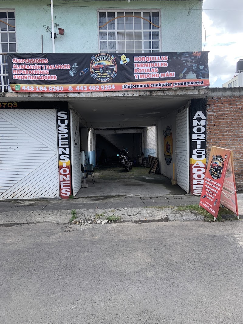 TOY’S GARAGE TALLER DE SUSPENSIÓN